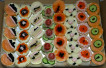 Gourmet Canapés with Salmon, Caviar, and Fresh Toppings - Image 1